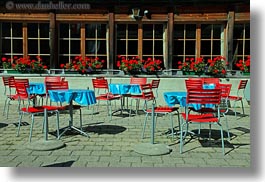 blues, chairs, europe, flowers, geraniums, horizontal, kandersteg, lake oeschinensee, nature, red, switzerland, tables, windows, photograph