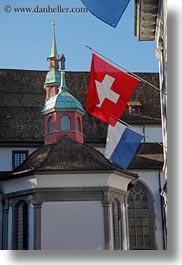 churches, europe, flags, lucerne, steeples, switzerland, towns, vertical, photograph