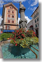 buildings, clouds, europe, flowers, fountains, lucerne, nature, sky, switzerland, towns, vertical, photograph