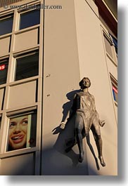 europe, lucerne, posters, statues, switzerland, towns, vertical, photograph