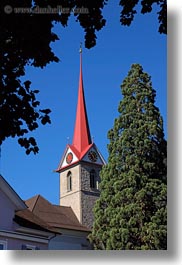churches, europe, lucerne, steeples, switzerland, trees, vertical, weggis, photograph