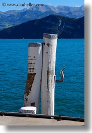 europe, lucerne, piers, pylons, switzerland, vertical, weggis, photograph