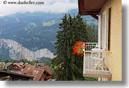 balconies, canyons, europe, flowers, geraniums, horizontal, meyers hotel, nature, switzerland, views, wengen, photograph
