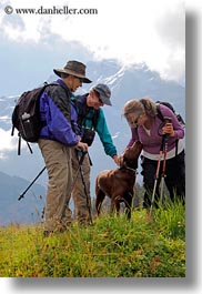 dogs, emotions, europe, groups, happy, hikers, laugh, men, people, playing, smiles, switzerland, vertical, womens, wt people, photograph