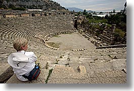 amphitheater, architectural ruins, europe, horizontal, myra, old myra, stones, tourists, turkeys, womens, photograph