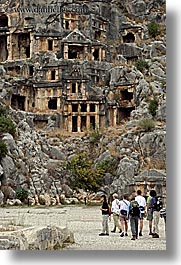architectural ruins, caves, europe, myra, old, old myra, stones, tombs, tourists, turkeys, vertical, photograph