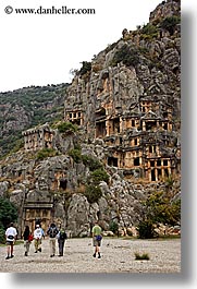 architectural ruins, caves, europe, myra, old, old myra, stones, tombs, tourists, turkeys, vertical, photograph