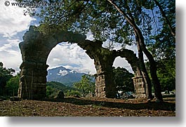 aquaduct, arches, architectural ruins, archways, europe, horizontal, phaselis, trees, turkeys, photograph