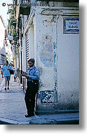 caribbean, cop, cuba, cuban, havana, island nation, islands, latin america, men, people, south america, vertical, photograph