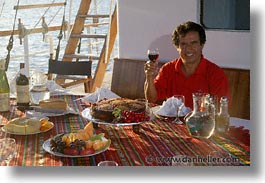 boats, ecuador, equator, foods, galapagos, galapagos islands, horizontal, islands, latin america, men, ocean, pacific ocean, sagitta, south pacific, water, wines, photograph