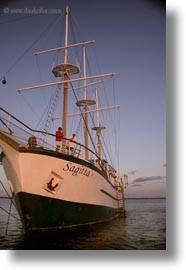 afloat, boats, ecuador, equator, galapagos islands, latin america, sagitta, sails down, vertical, photograph