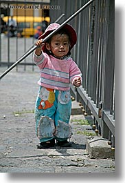 blues, childrens, clothes, colors, ecuador, equator, fences, girls, hats, latin america, pink, quito, toddlers, vertical, photograph