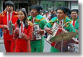 clothes, ecuador, equator, green, hats, horizontal, latin america, musicians, people, quito, red, uniformed, uniforms, photograph