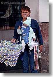 babies, ecuador, equator, latin america, lottery, people, quito, selling, tickets, vertical, womens, photograph