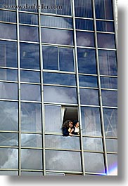 buildings, ecuador, equator, glasses, latin america, looking, out, people, quito, vertical, womens, photograph