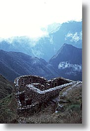 ancient ruins, andes, architectural ruins, inca trail, incan tribes, latin america, mountains, peru, phuyupatamarka, stone ruins, vertical, photograph