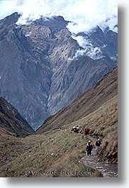 ancient ruins, andes, architectural ruins, hikers, inca trail, incan tribes, latin america, mountains, peru, scenics, stone ruins, vertical, photograph