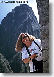 ancient ruins, andes, architectural ruins, barrie, inca trail, incan tribes, latin america, mountains, people, peru, stone ruins, vertical, photograph