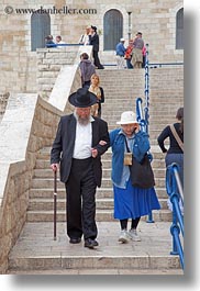 cells, clothes, hats, israel, jerusalem, jewish, men, middle east, people, phones, religious, vertical, womens, photograph