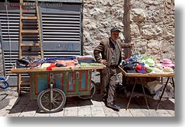 beret, clothes, hats, horizontal, israel, jerusalem, men, middle east, people, selling, stuff, photograph
