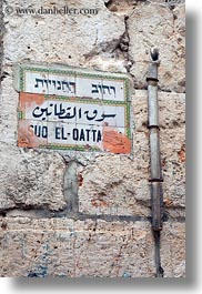 arabic, hebrew, israel, jerusalem, language, middle east, pipes, signs, vertical, photograph