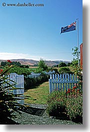 bayof islands, fences, flags, new zealand, picket, vertical, photograph