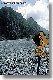 fox glacier, new zealand, rocks, signs, slide, vertical, photograph