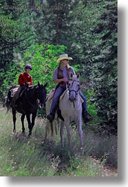 activities, america, boys, childrens, clothes, cowboy hat, forests, hats, horseback riding, horses, idaho, nature, north america, people, plants, red horse mountain ranch, riding, trees, united states, vertical, womens, photograph