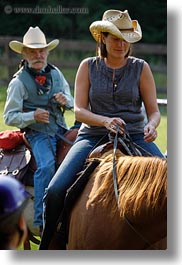 activities, america, clothes, cowboy hat, hats, horseback riding, horses, idaho, men, north america, people, red horse mountain ranch, tony, united states, vertical, womens, photograph