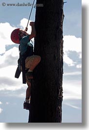 activities, america, boys, childrens, climbing, clothes, hats, helmets, idaho, north america, people, red horse mountain ranch, tree climb, trees, united states, vertical, photograph