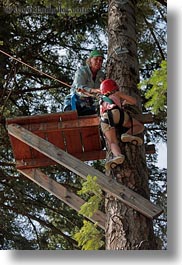 activities, america, childrens, climbing, clothes, girls, hats, helmets, idaho, north america, people, red horse mountain ranch, tree climb, trees, united states, vertical, photograph