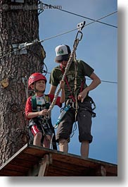activities, america, clothes, hats, helmets, idaho, kid, nature, north america, plants, red horse mountain ranch, trees, united states, vertical, zip line, zipline, photograph