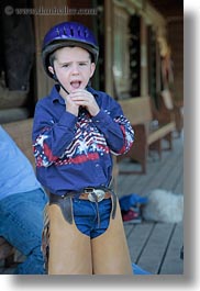 america, boys, childrens, clothes, hats, helmets, idaho, north america, people, red horse mountain ranch, riding, united states, vertical, photograph