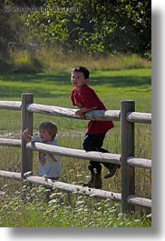 alex, america, boys, childrens, fences, idaho, jacks, north america, people, red horse mountain ranch, united states, vertical, photograph