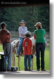 america, families, horses, idaho, north america, people, red horse mountain ranch, united states, vertical, watching, photograph