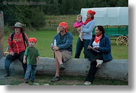 america, emotions, horizontal, idaho, logs, north america, people, red horse mountain ranch, sitting, smiles, united states, photograph