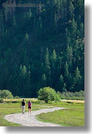 america, couples, idaho, north america, red horse mountain ranch, roads, scenics, united states, vertical, walking, photograph