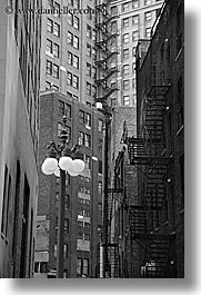 america, black and white, buildings, chicago, illinois, lamp posts, north america, streets, united states, vertical, photograph