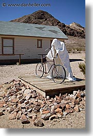 america, bicycles, ghost, ghost town, nevada, north america, rhyolite, united states, vertical, western usa, photograph