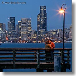 activities, america, buildings, cityscapes, couples, emotions, kissing, lamp posts, long exposure, nite, north america, pacific northwest, piers, romantic, seattle, square format, structures, united states, washington, western usa, photograph