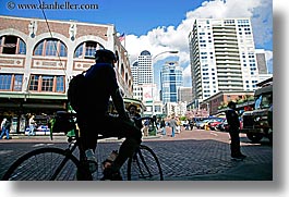 activities, america, bicycles, buildings, cityscapes, horizontal, north america, pacific northwest, pike place, riders, seattle, silhouettes, structures, transportation, united states, washington, western usa, photograph