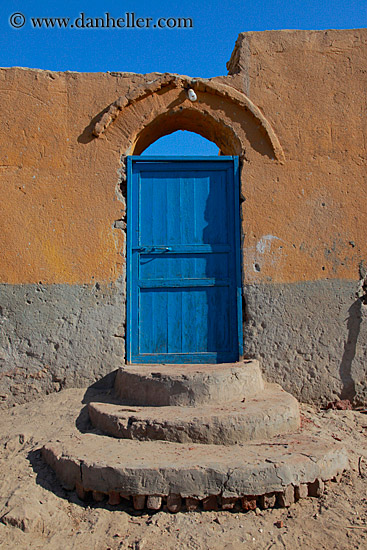 blue-door-n-mud-wall-1.jpg