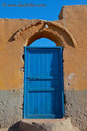 blue-door-n-mud-wall-2.jpg