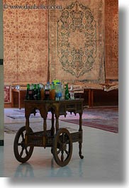africa, cairo, carpet shop, carts, egypt, rugs, sodas, vertical, wooden, photograph