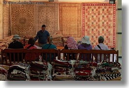 africa, cairo, carpet shop, egypt, horizontal, rugs, tourists, photograph