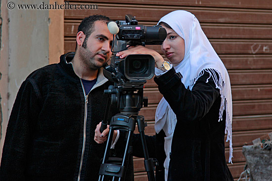 arab-man-n-woman-on-video-camera.jpg