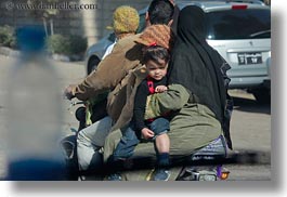 africa, burka, cairo, clothes, dresses, egypt, families, horizontal, motorcyce, people, photograph