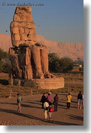 africa, colossi of memnon, crowds, egypt, seated, statues, vertical, photograph