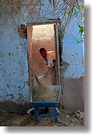 africa, doorways, egypt, men, nubian village, shoveling, vertical, photograph