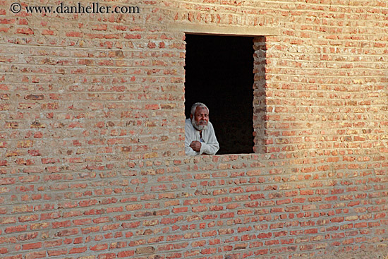old-man-in-brick-house-window-01.jpg